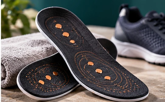 Magnetic-style insoles displayed with footwear